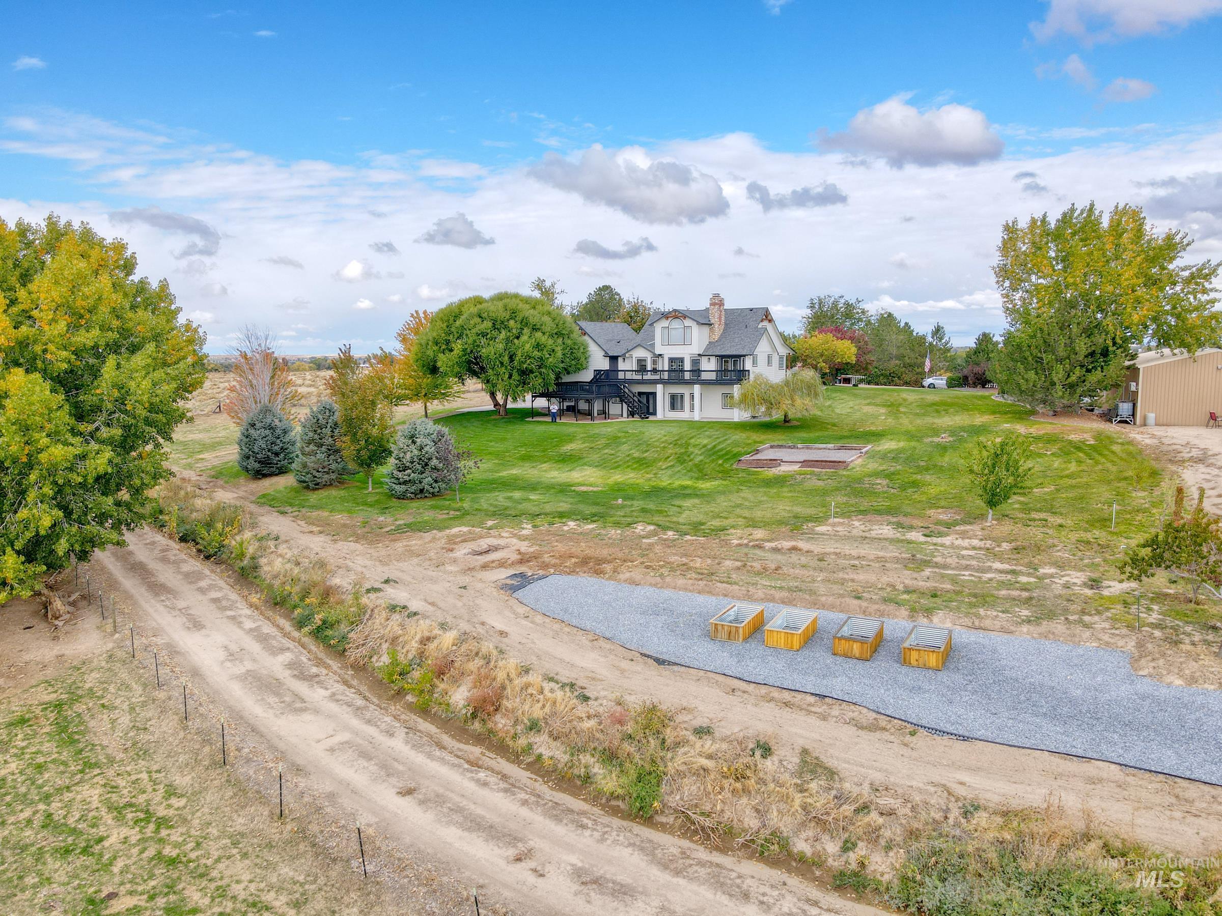 16277 Sand Hollow Road Caldwell, ID 83607 - Photo 35 of 39 View of community featuring a lawn