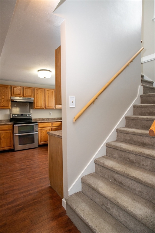 35 Cedar Street, Unit 2 Gardner, MA 01440 - Photo 20 of 32 a kitchen with cabinets and steel appliances