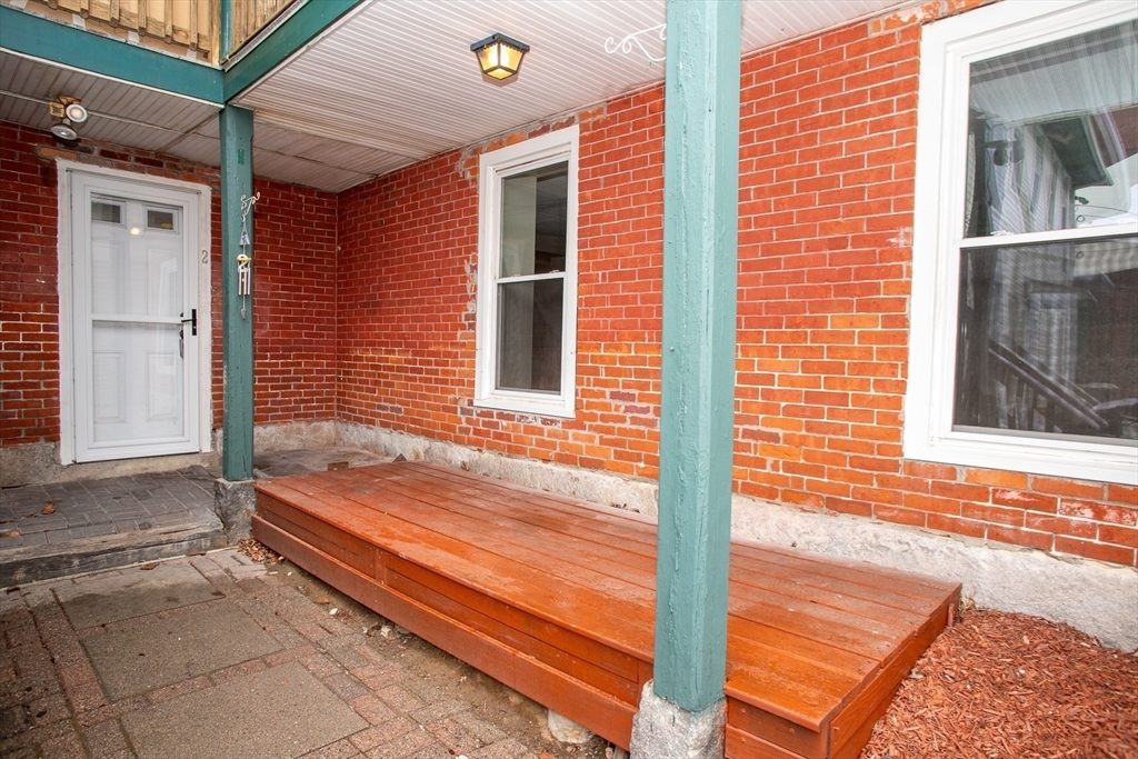 35 Cedar Street, Unit 2 Gardner, MA 01440 - Photo 4 of 32 a view of a entryway door of the house