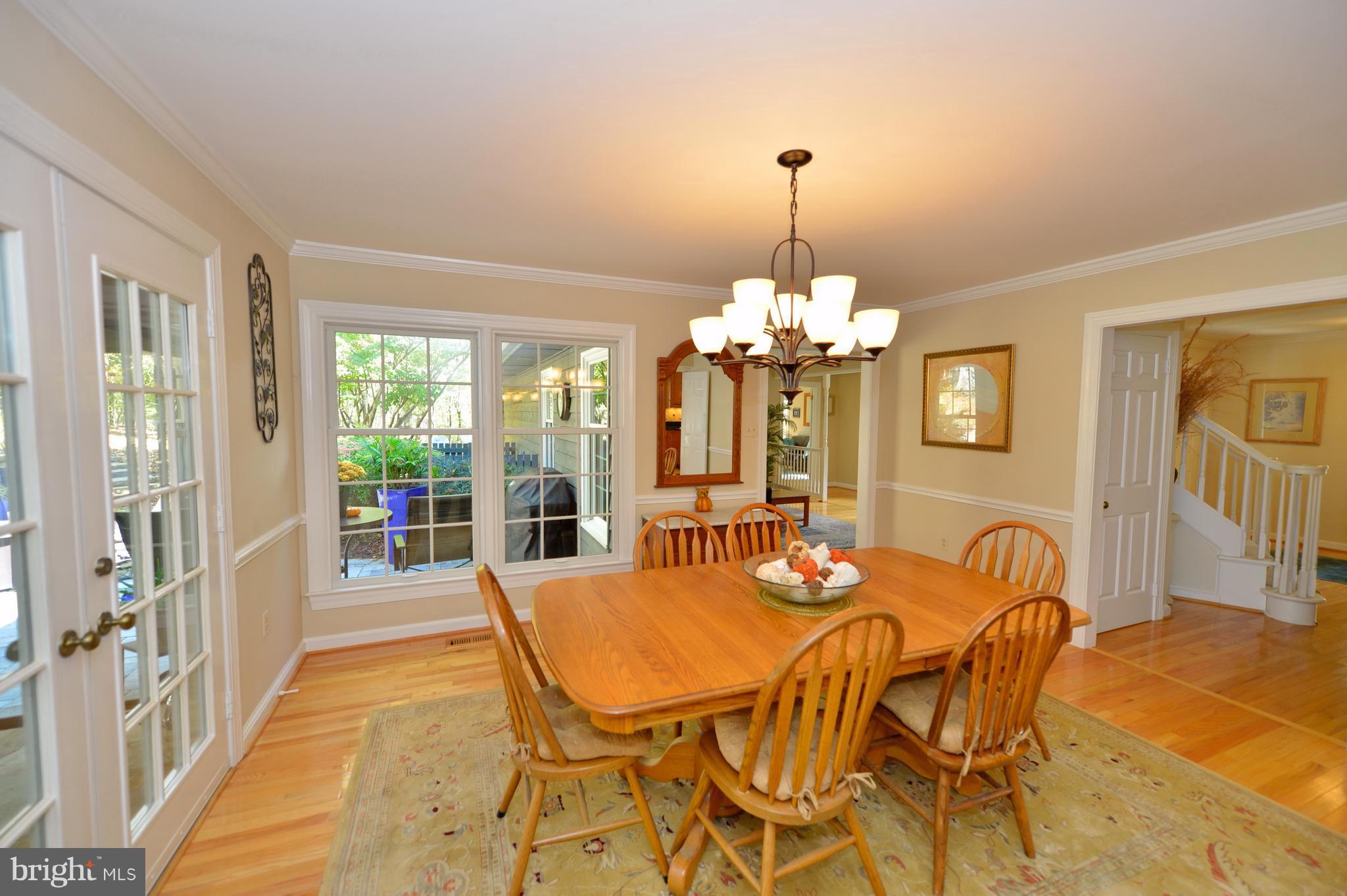 37340 Bolyn Road Purcellville, VA 20132 - Photo 9 of 30 Dining room opens to 3 season room- great flow!