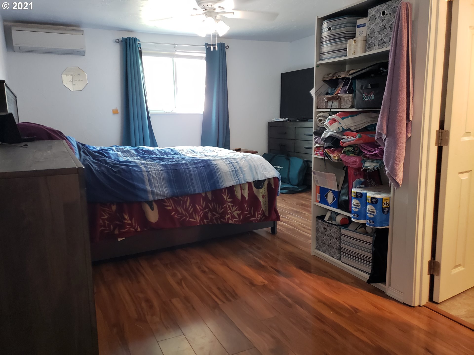 189 33rd Street Springfield, OR 97478 - Photo 9 of 24 a bed sitting in a bedroom next to a window