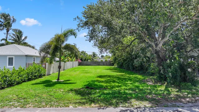 a view of a backyard with a garden