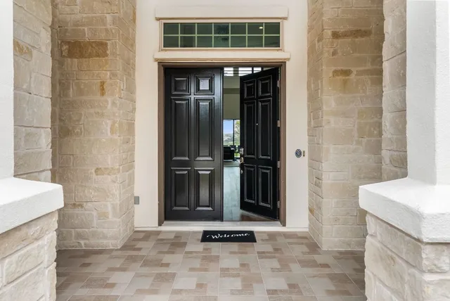 a view of an entryway with a door