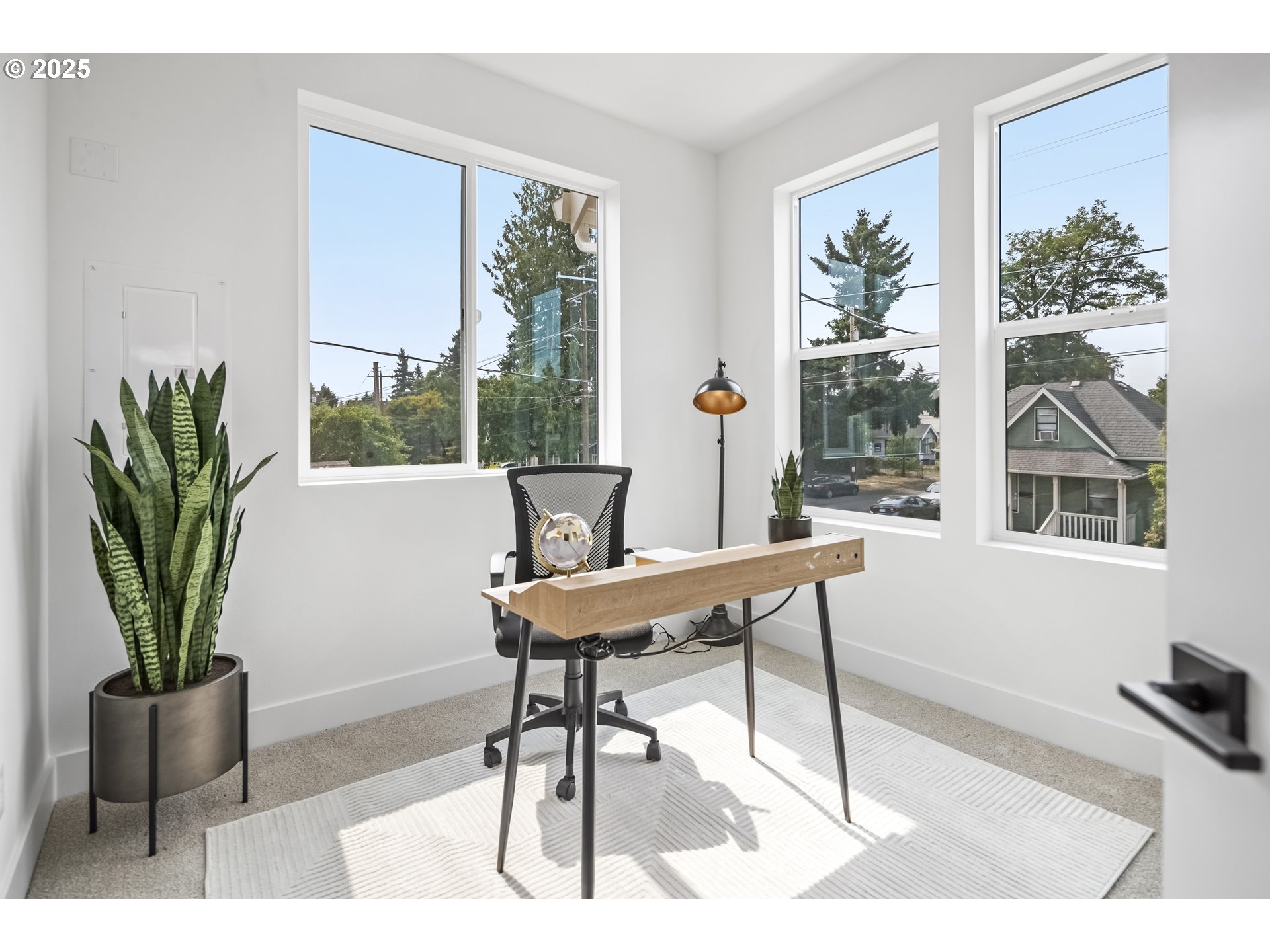 4730 Southeast 65th Avenue Portland, OR 97206 - Photo 16 of 16 a living room with furniture and a potted plant