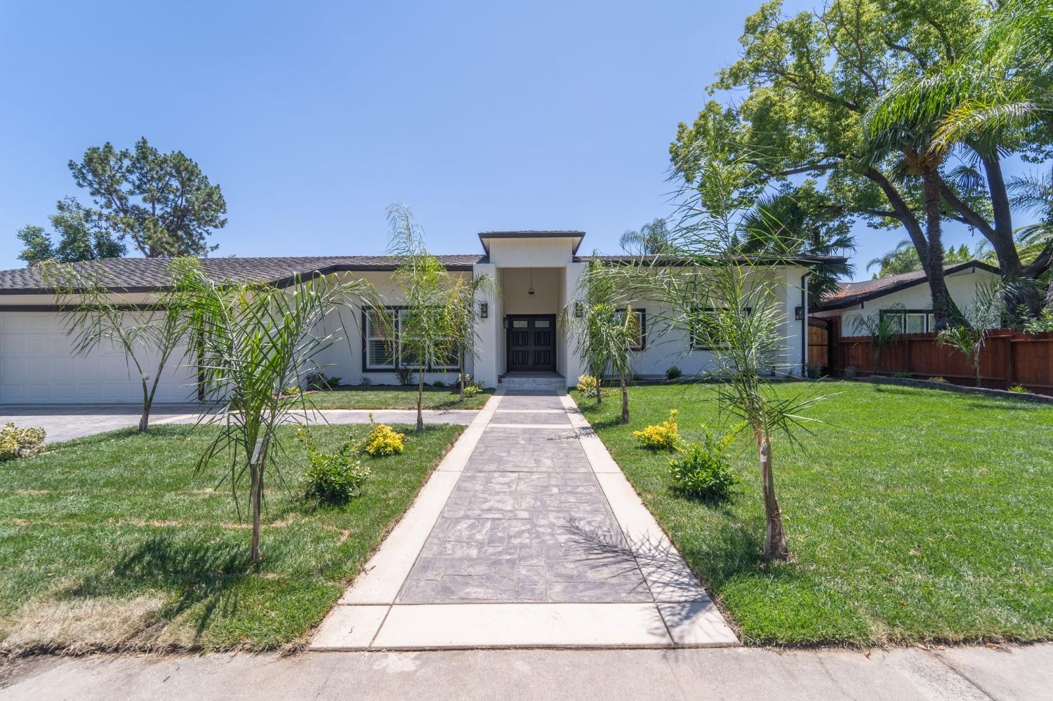 508 West Rumble Road Modesto, CA 95350 - Photo 1 of 1 front view of a house with a yard