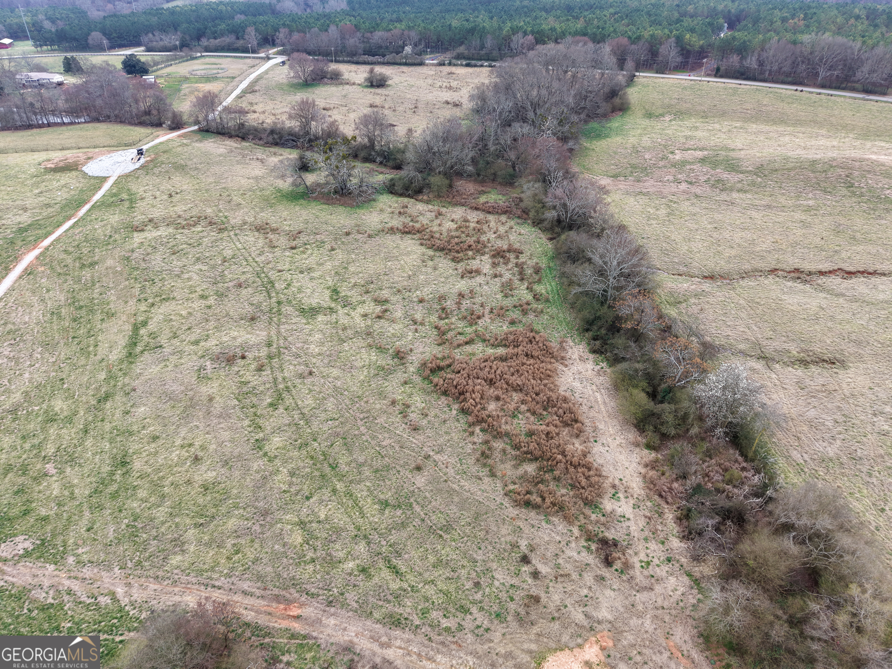 7 Red Rose Court Nicholson, GA 30565 - Photo 36 of 81 a view of a dry yard with wooden fence