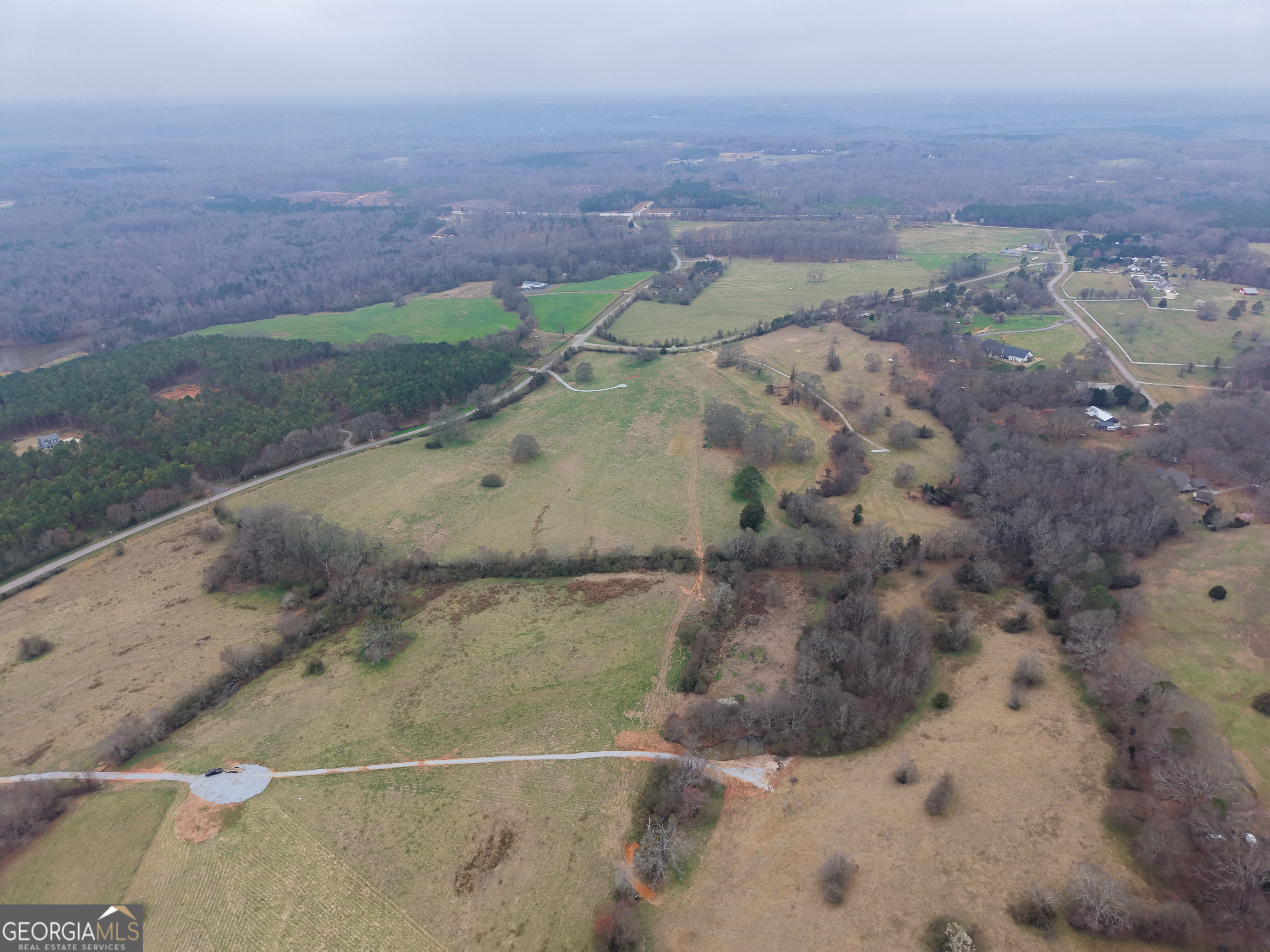 7 Red Rose Court Nicholson, GA 30565 - Photo 74 of 81 a view of a big yard with a mountain in the background