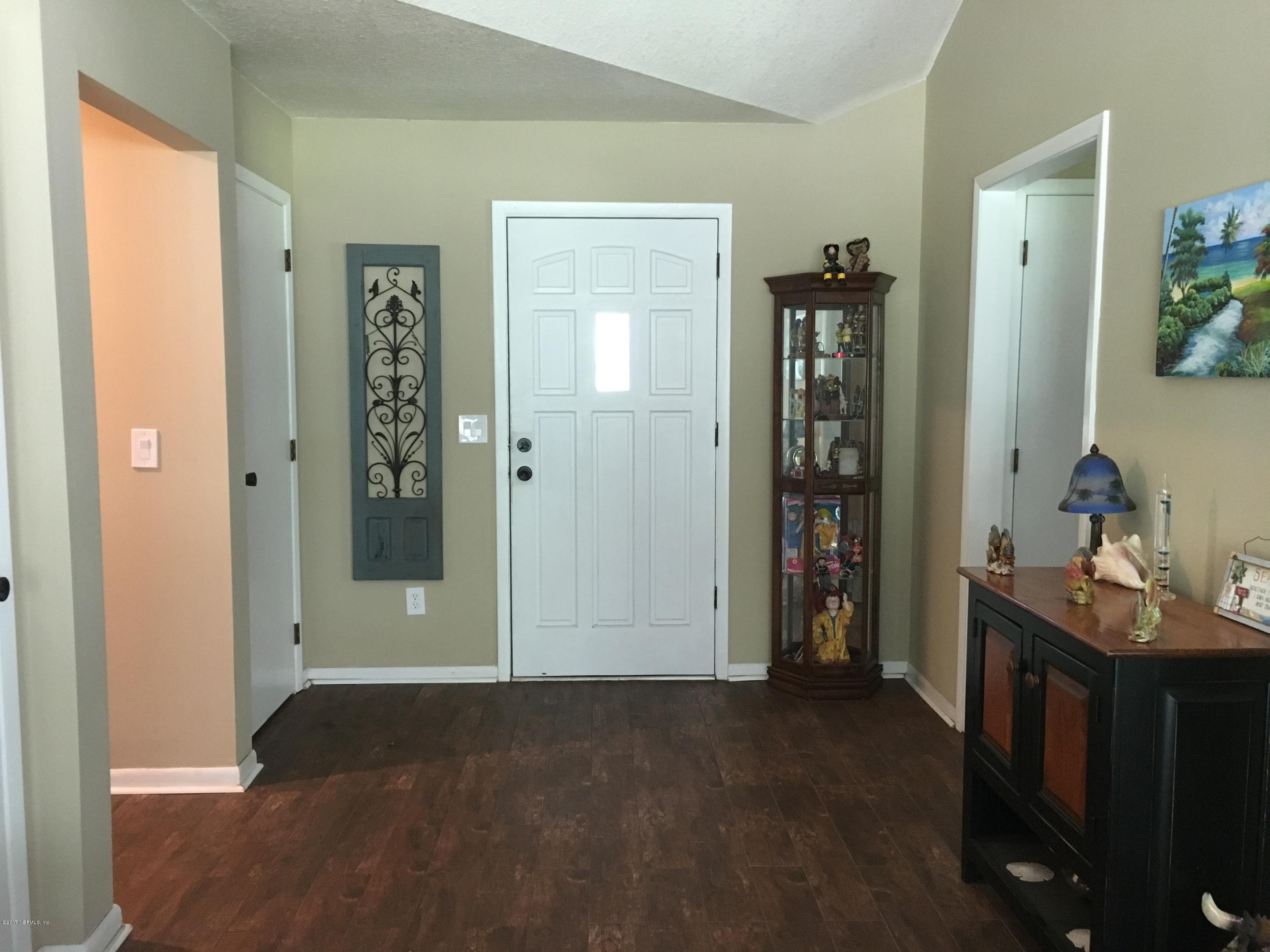 3098 Pacetti Road, Unit LOT I St. Augustine, FL 32092 - Photo 3 of 37 a view of hallway with livingroom and bedroom view