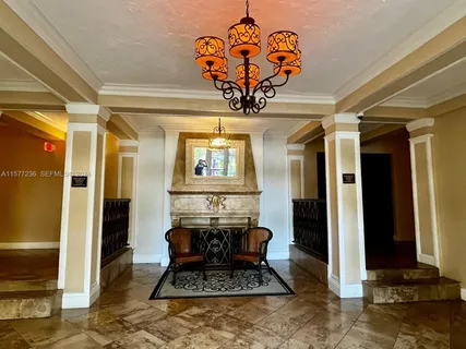 a dining room filled with furniture