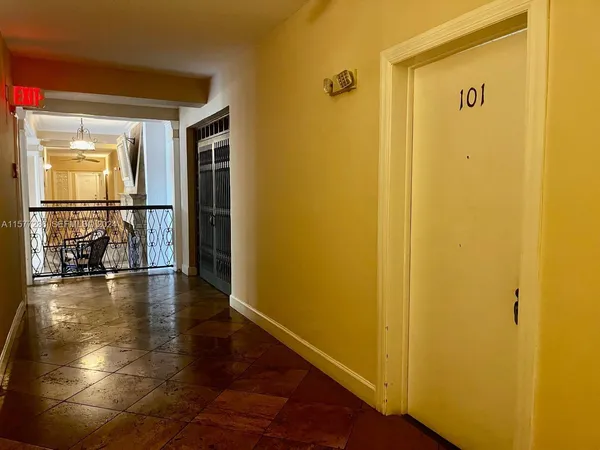 a view of a livingroom with wooden floor