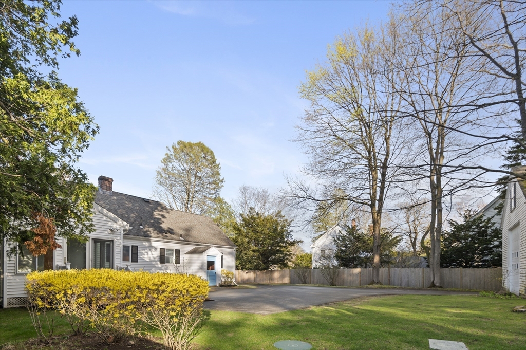 110 Linden Street Hamilton, MA 01982 - Photo 25 of 25 a front view of a house with garden