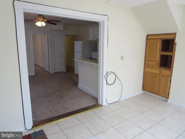 wooden floor with a bathroom