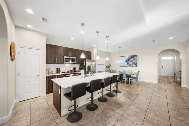 a large kitchen with lots of counter space and appliances