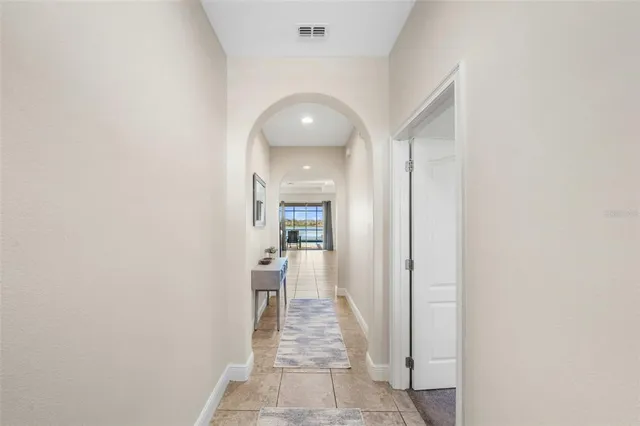 a view of a hallway with a white walls