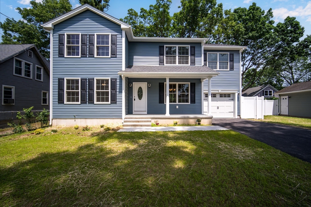 10 Kittrell Street Springfield, MA 01119 - Photo 1 of 42 a front view of a house with a yard