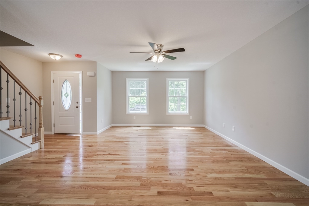 10 Kittrell Street Springfield, MA 01119 - Photo 11 of 42 wooden floor in an empty room with a window