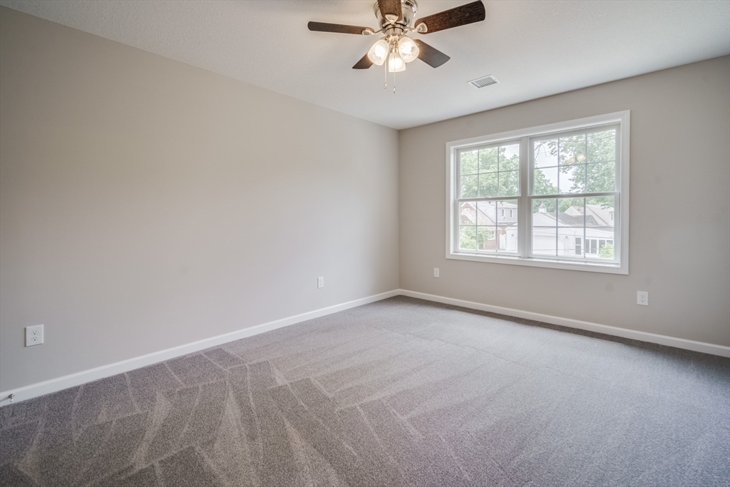 10 Kittrell Street Springfield, MA 01119 - Photo 23 of 42 a view of an empty room with a window