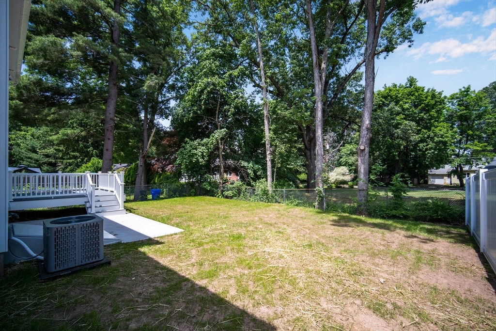 10 Kittrell Street Springfield, MA 01119 - Photo 42 of 42 a backyard of a house with table and chairs