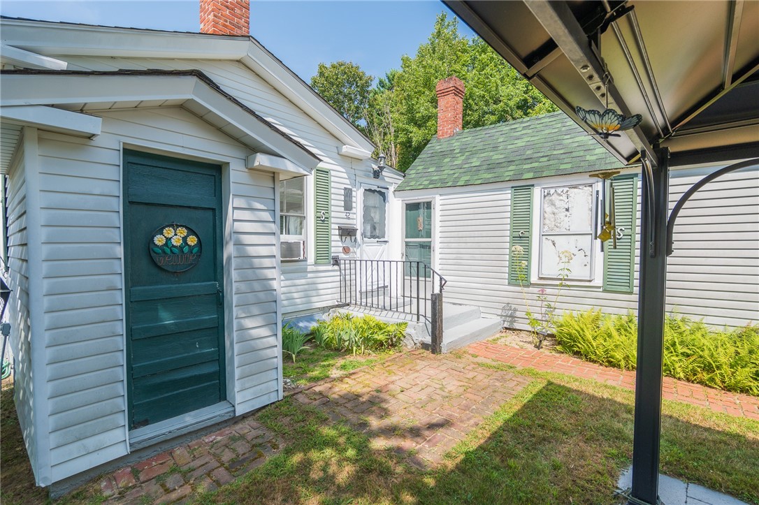 42 Steere Farm Road Burrillville, RI 02830 - Photo 8 of 49 Back entry and basement walkout
