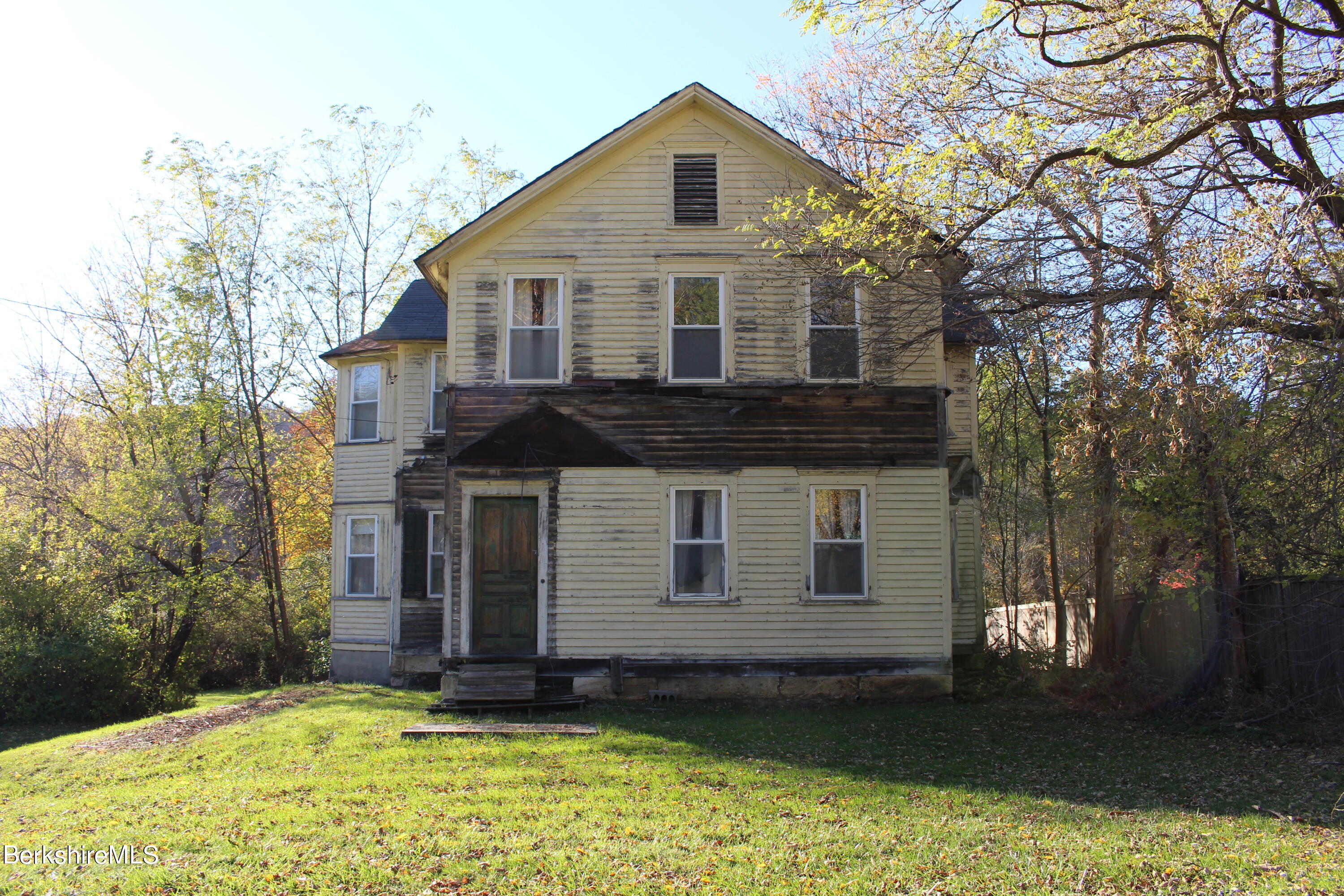 1 Pittsfield Road Lenox, MA 01240 - Photo 3 of 14 a view of a house with a yard