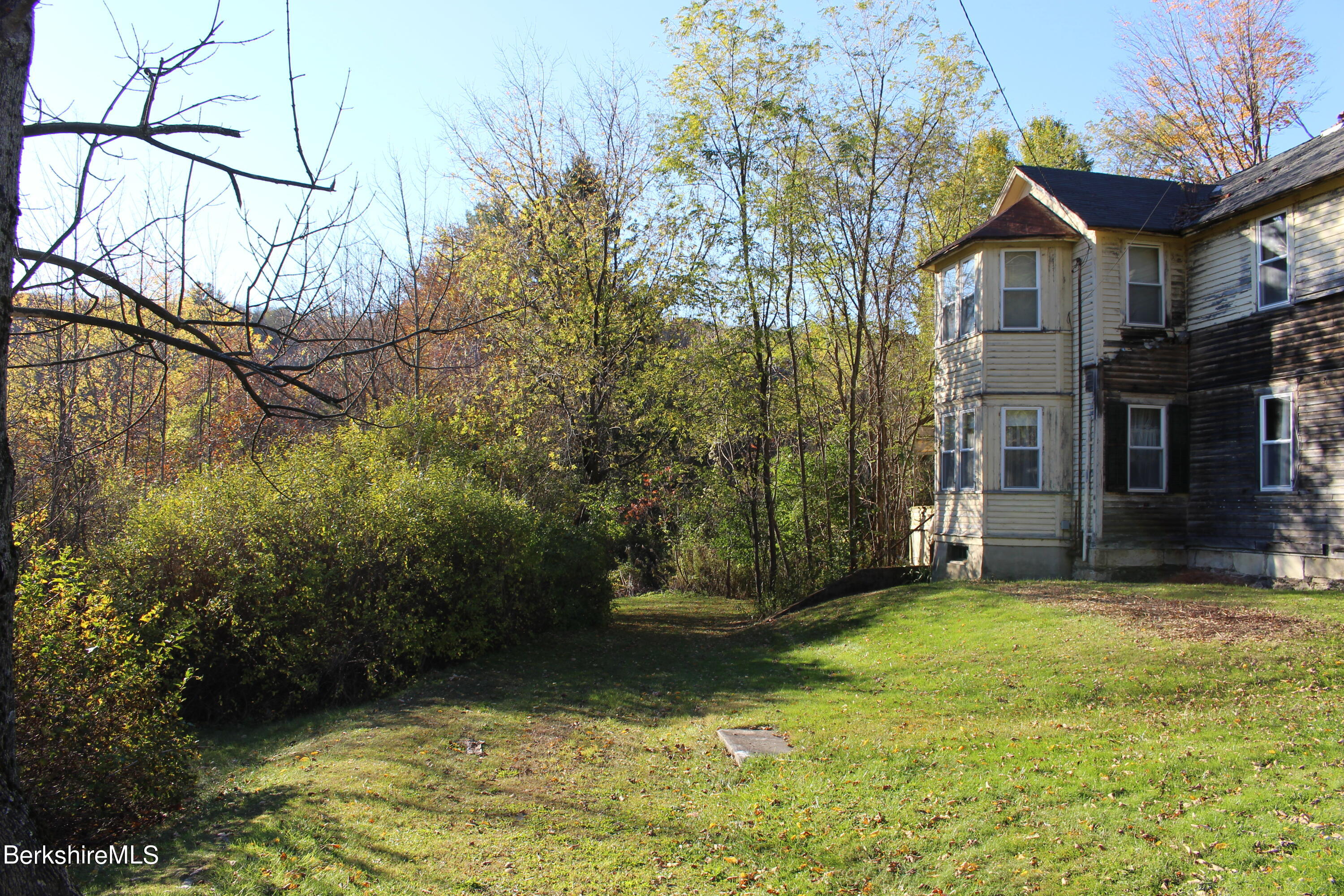 1 Pittsfield Road Lenox, MA 01240 - Photo 5 of 14 a view of a yard in front of house