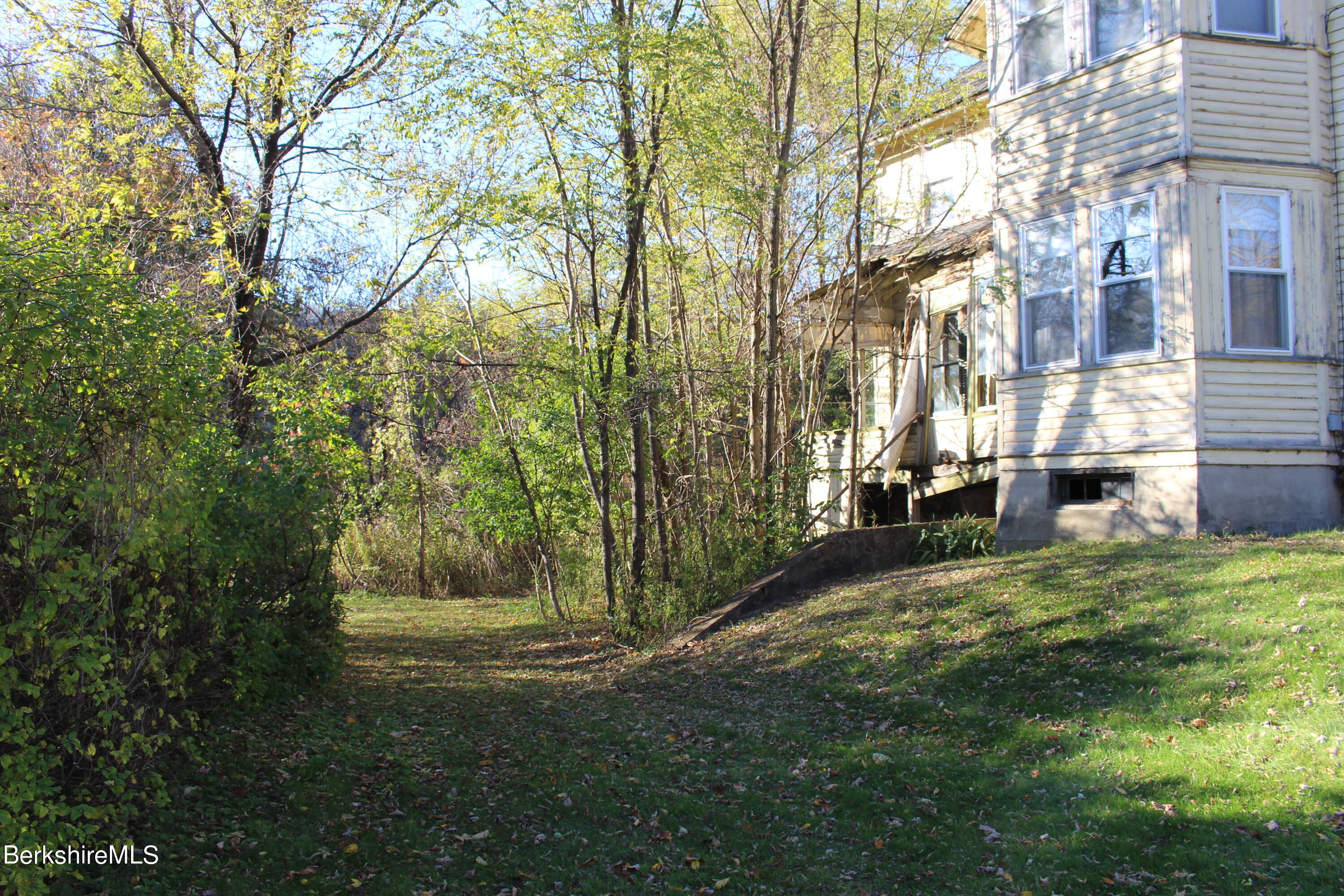 1 Pittsfield Road Lenox, MA 01240 - Photo 8 of 14 a view of backyard of the house