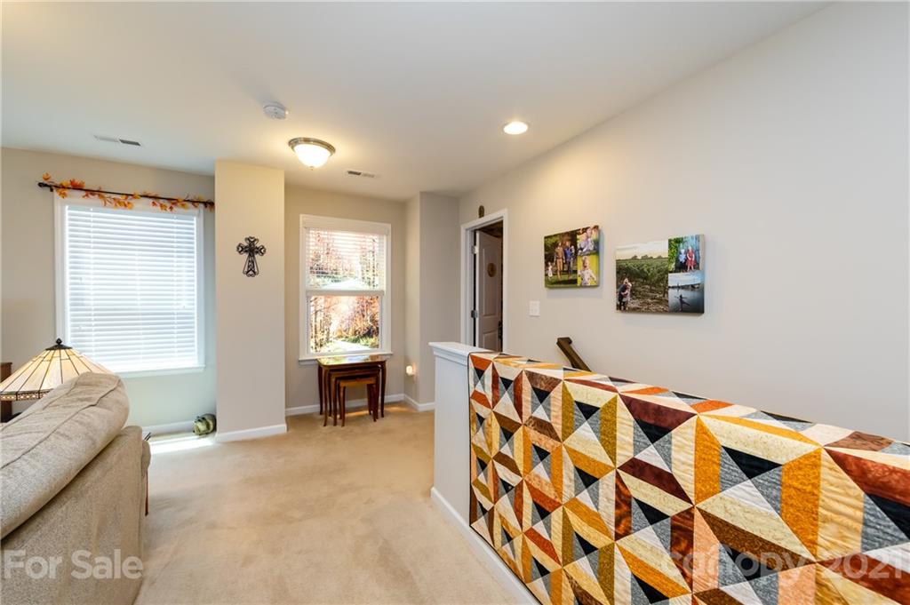 4822 Abendego Road Charlotte, NC 28213 - Photo 25 of 48 a bedroom with furniture and a window