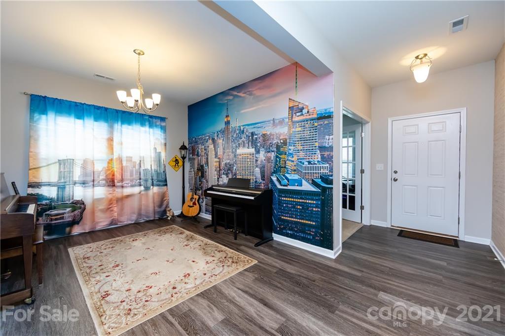 4822 Abendego Road Charlotte, NC 28213 - Photo 5 of 48 a view of a room with gym equipment