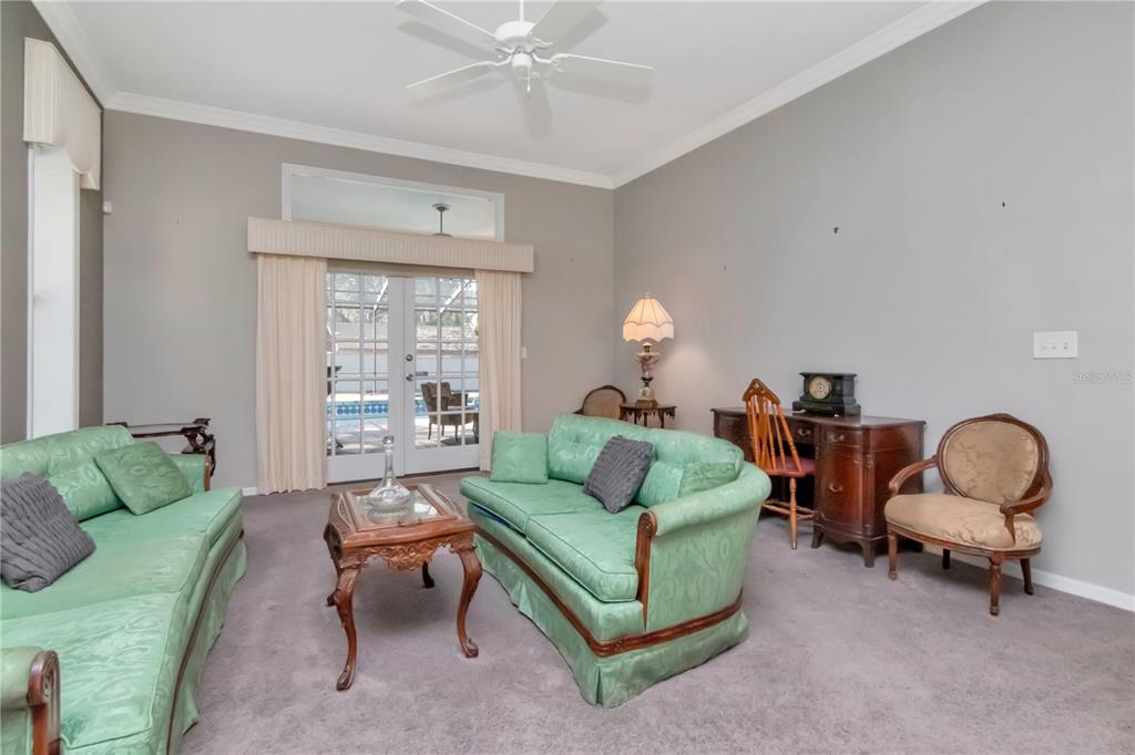 4511 Country Gate Court Valrico, FL 33596 - Photo 26 of 64 a living room with furniture and a window