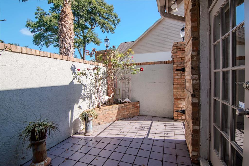 4511 Country Gate Court Valrico, FL 33596 - Photo 29 of 64 a view of a pathway along a building