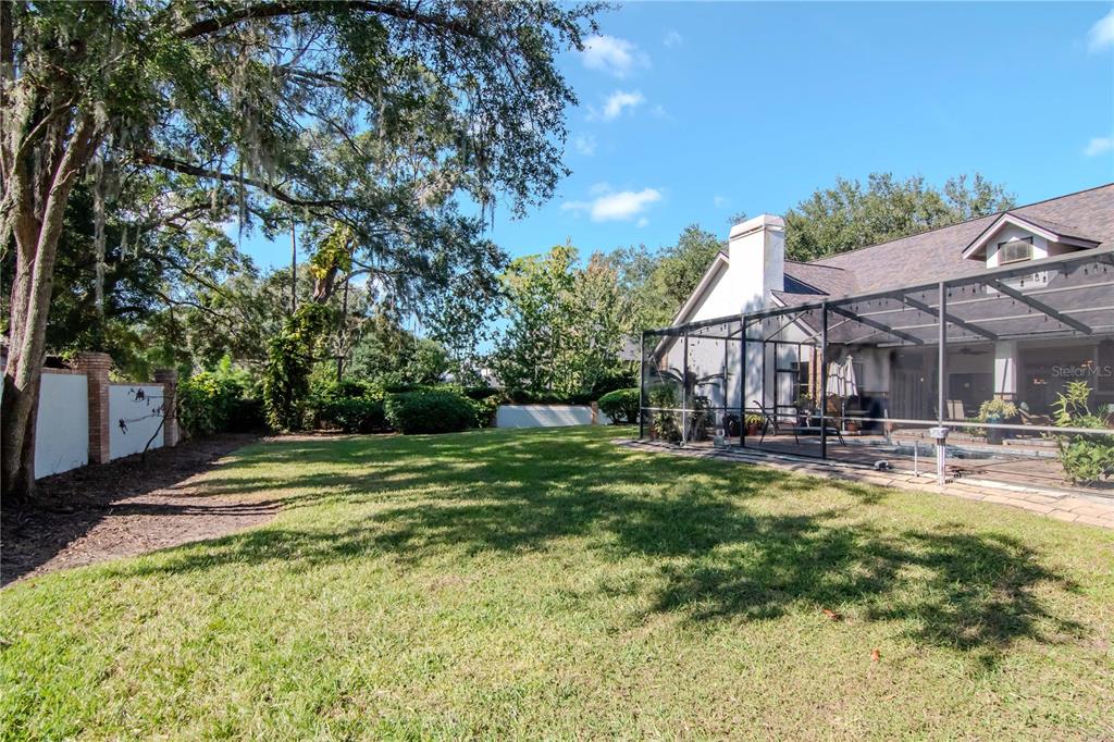 4511 Country Gate Court Valrico, FL 33596 - Photo 54 of 64 a view of a house with pool and sitting area