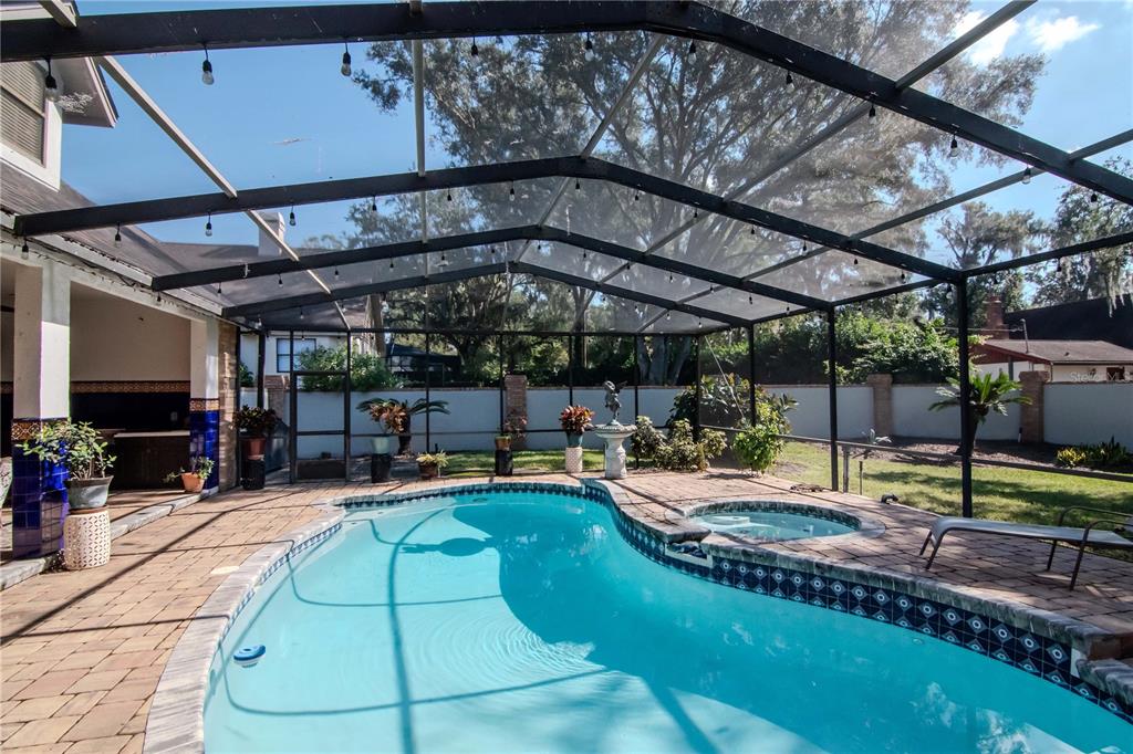 4511 Country Gate Court Valrico, FL 33596 - Photo 55 of 64 a view of a swimming pool with a patio