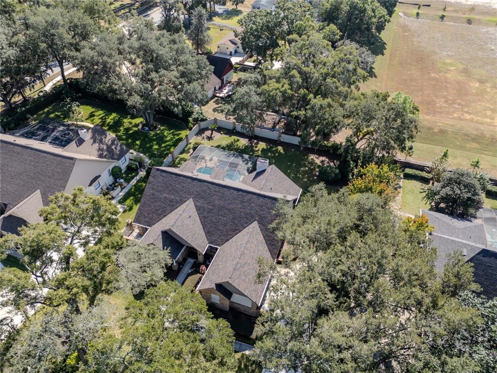 4511 Country Gate Court Valrico, FL 33596 - Photo 60 of 64 an aerial view of a house with a yard