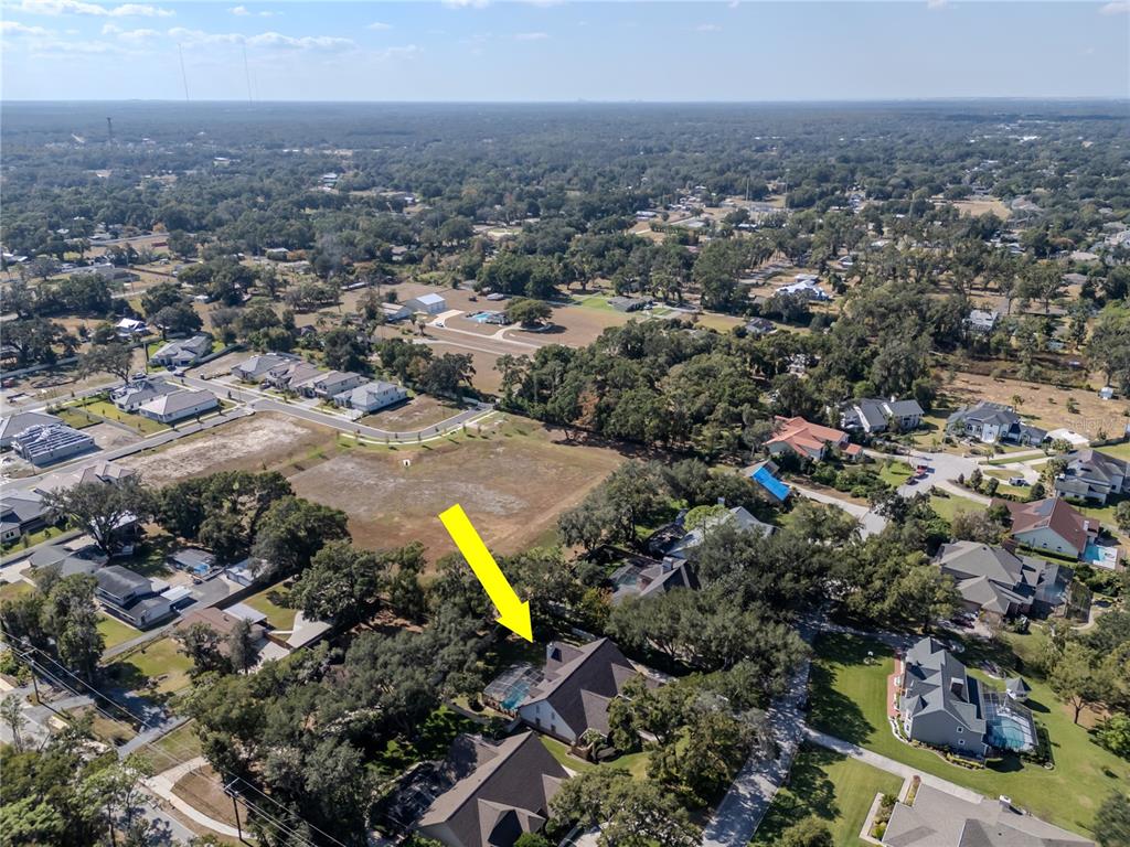 4511 Country Gate Court Valrico, FL 33596 - Photo 62 of 64 an aerial view of a houses with a swimming pool