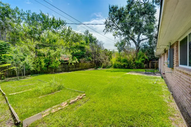 a view of a field with grass