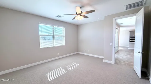 a bathroom with a sink a toilet a shower and a mirror