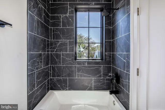 a bathroom with a bathtub