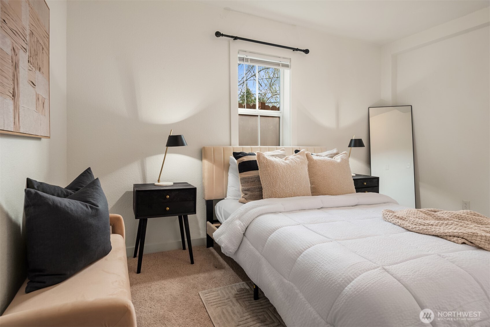 5115 South Roxbury Street Seattle, WA 98118 - Photo 21 of 29 a bedroom with a bed and window