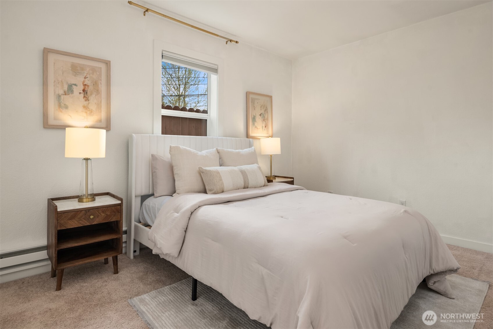 5115 South Roxbury Street Seattle, WA 98118 - Photo 22 of 29 a bedroom with a bed and a night stand