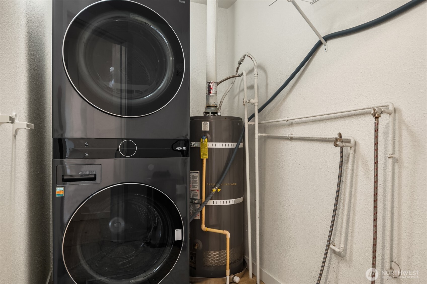 5115 South Roxbury Street Seattle, WA 98118 - Photo 26 of 29 a utility room with dryer and washer
