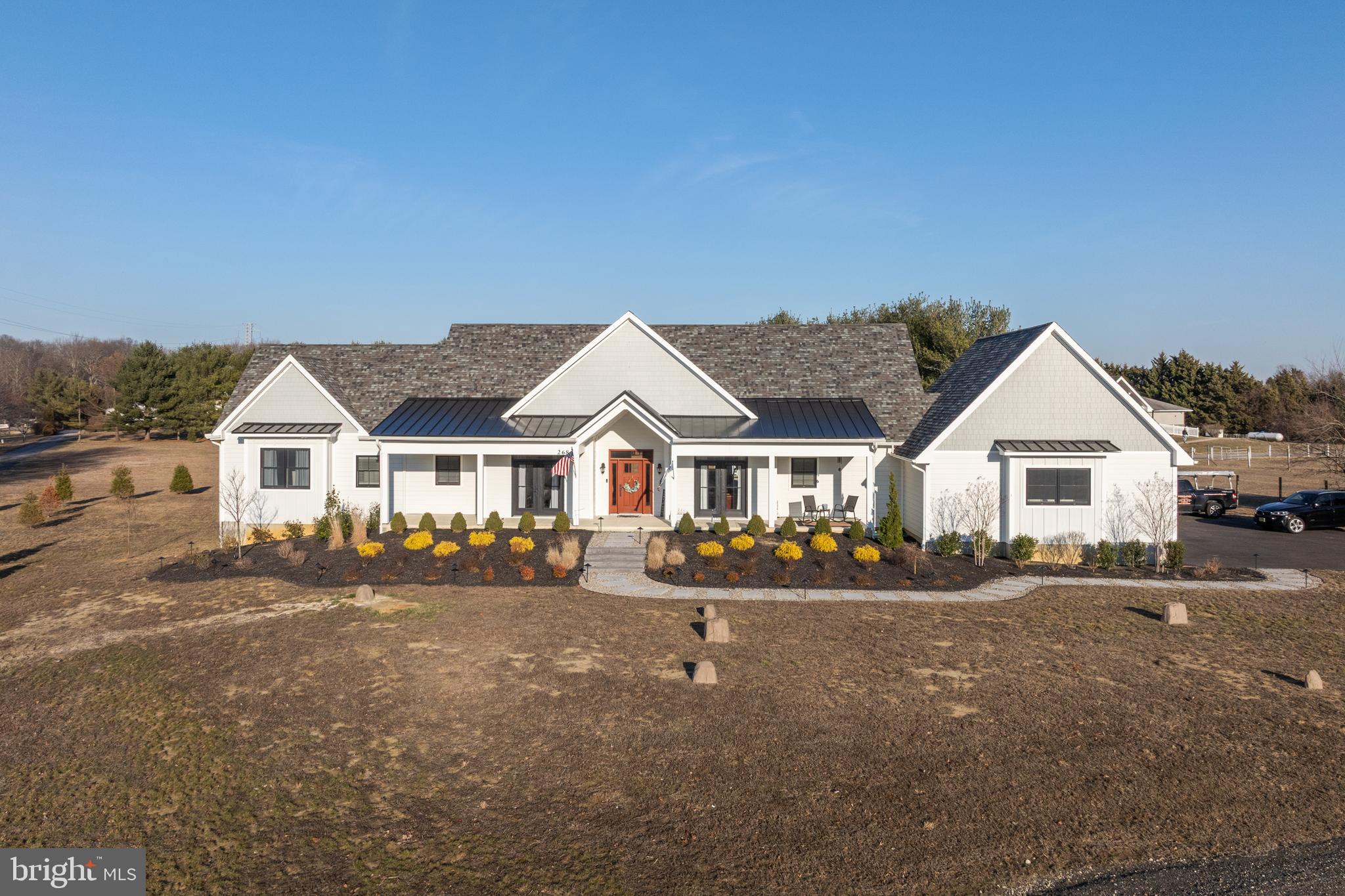 268 Hartford Road Medford, NJ 08055 - Photo 46 of 54 a front view of a house with a yard