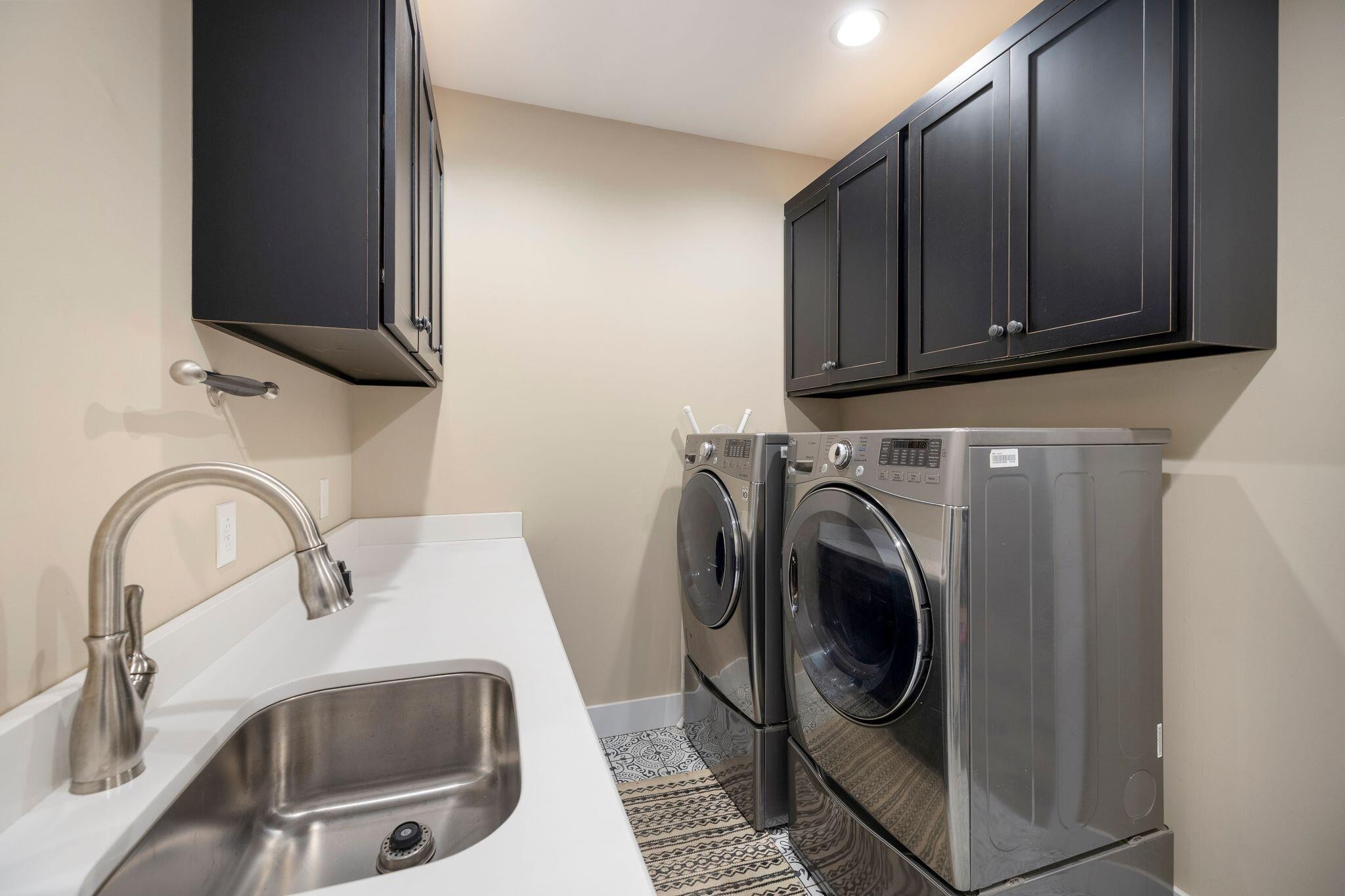 6866 Daus Mountain Road Whitwell, TN 37397 - Photo 27 of 49 a utility room with sink washer and dryer