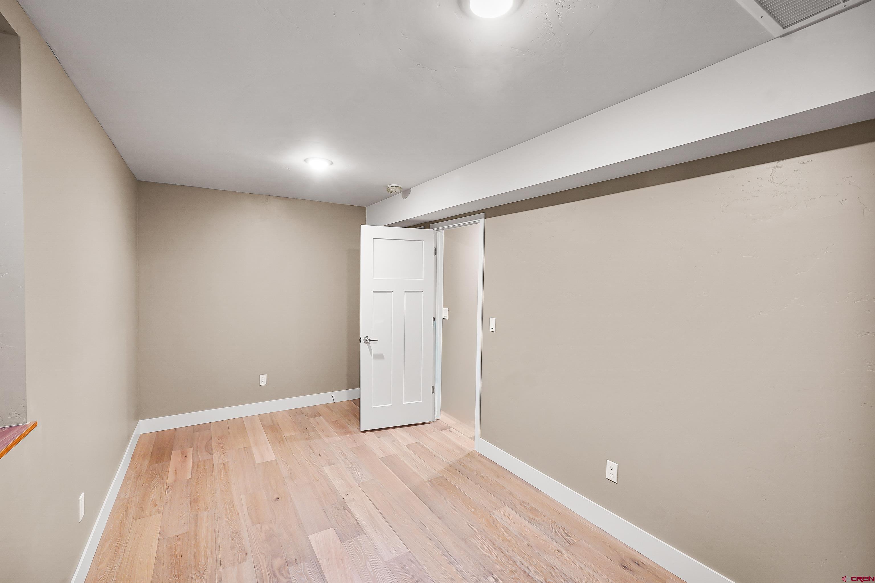 760 Goeglein Gulch Road, Unit 5 Durango, CO 81301 - Photo 25 of 35 Walk in closet and bath on lower level with egress.