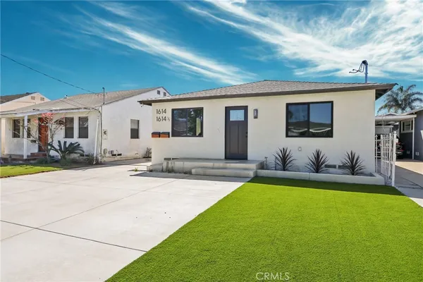 a house view with a outdoor space