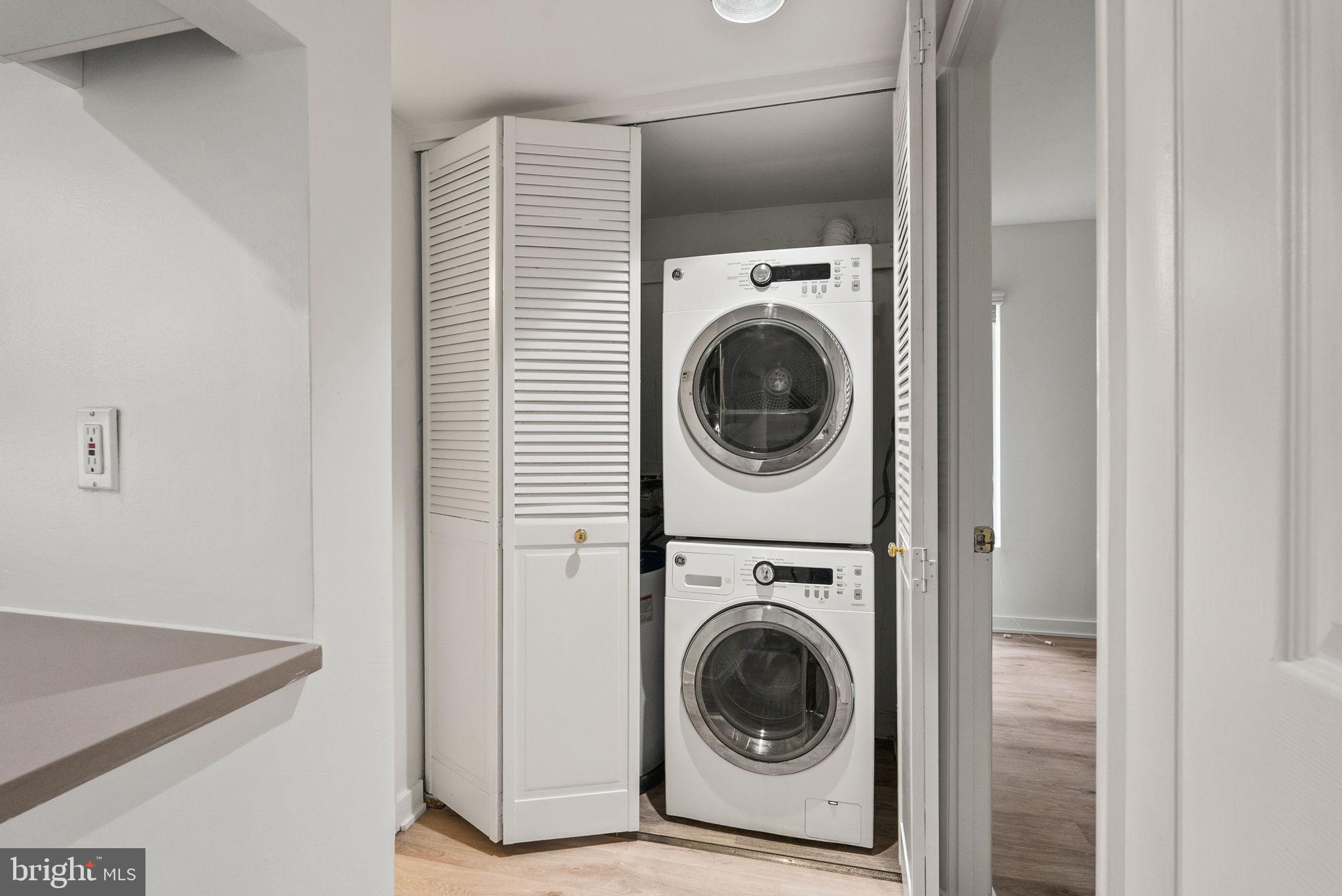 601 24th Street Northwest, Unit 306 Washington, DC 20037 - Photo 27 of 34 a utility room with dryer and washer