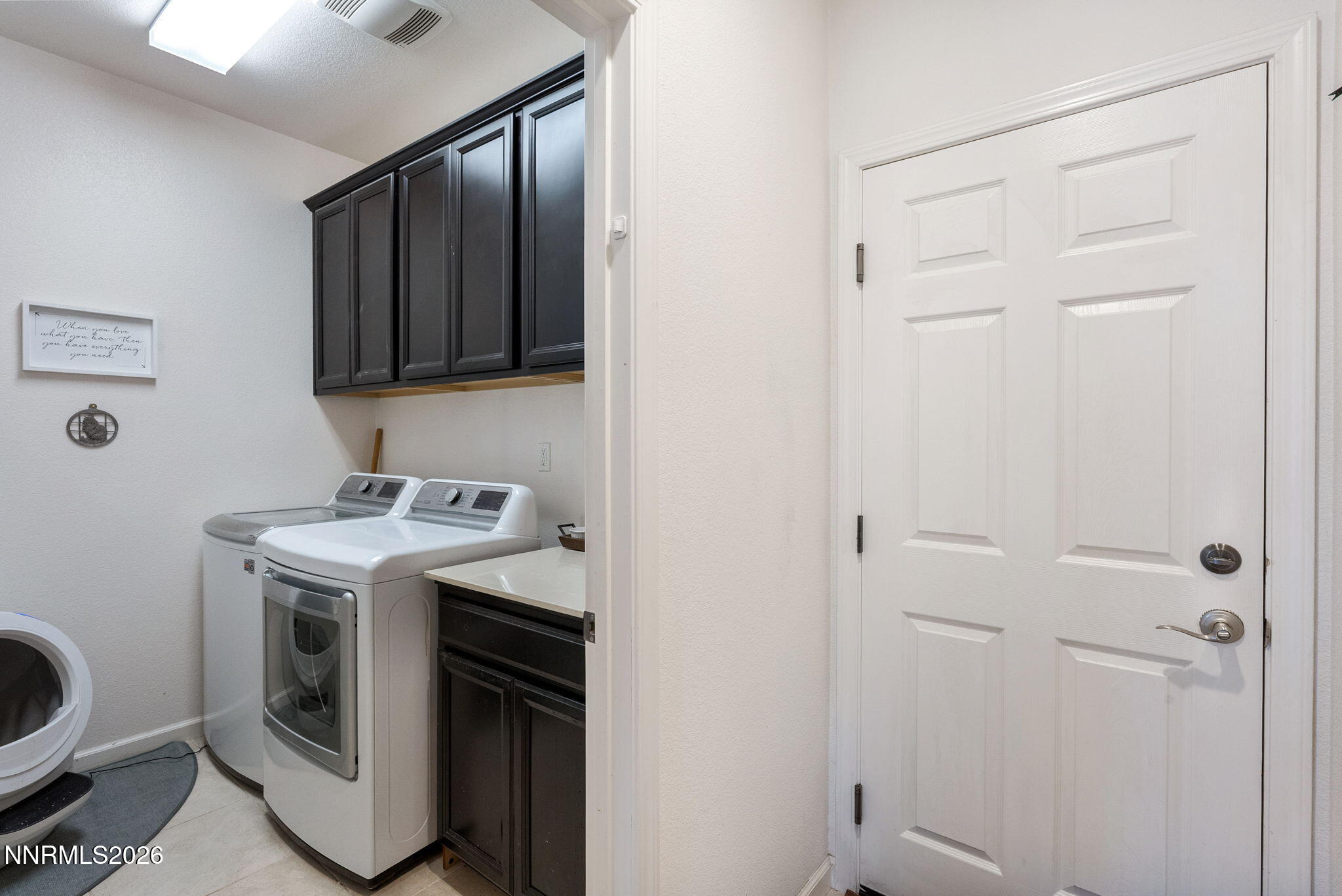 2190 Dutch Draft Drive Reno, NV 89521 - Photo 18 of 32 a utility room with dryer and washer