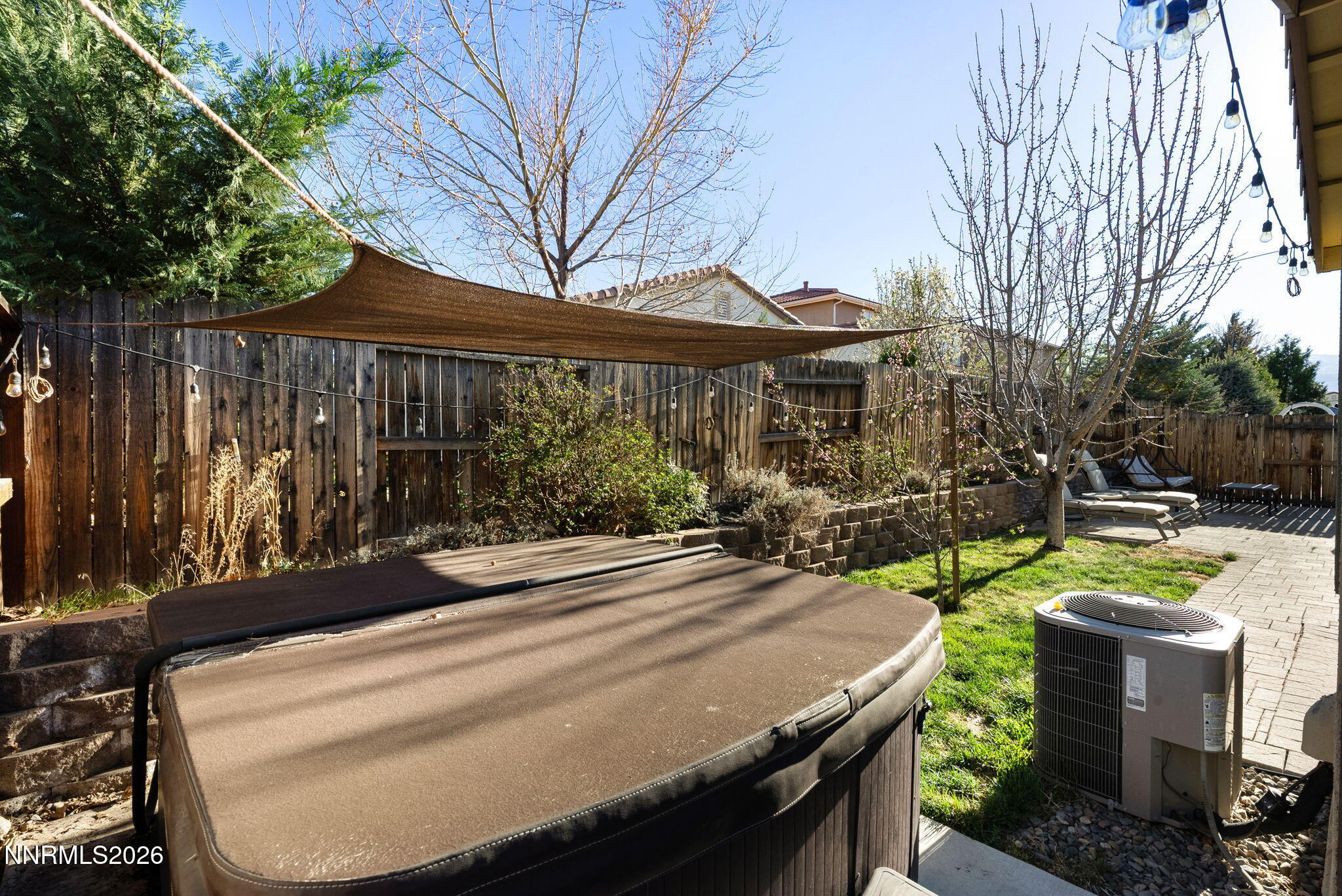 2190 Dutch Draft Drive Reno, NV 89521 - Photo 29 of 32 a view of a patio with table and chairs and wooden fence