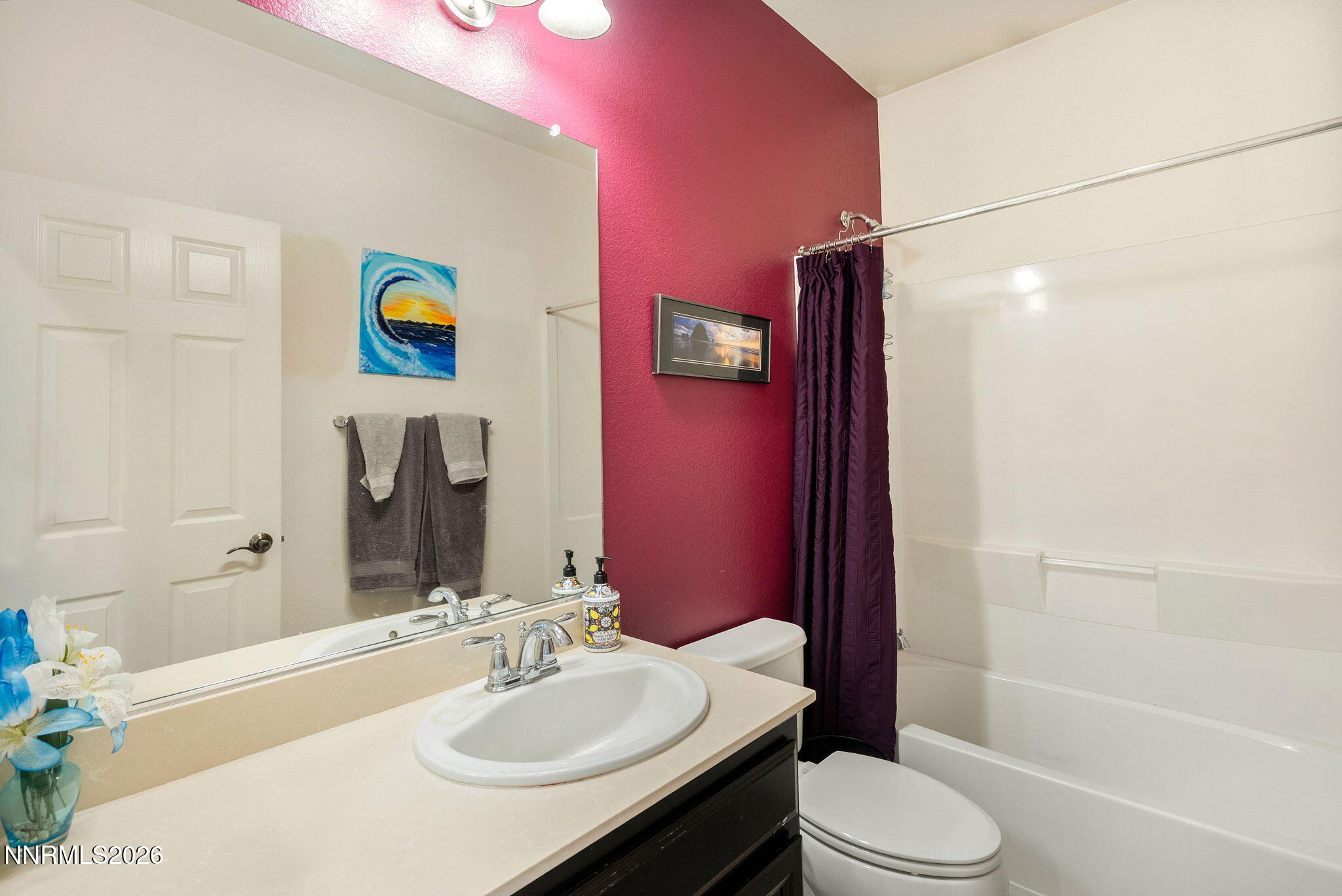 2190 Dutch Draft Drive Reno, NV 89521 - Photo 9 of 32 a bathroom with a sink toilet and shower