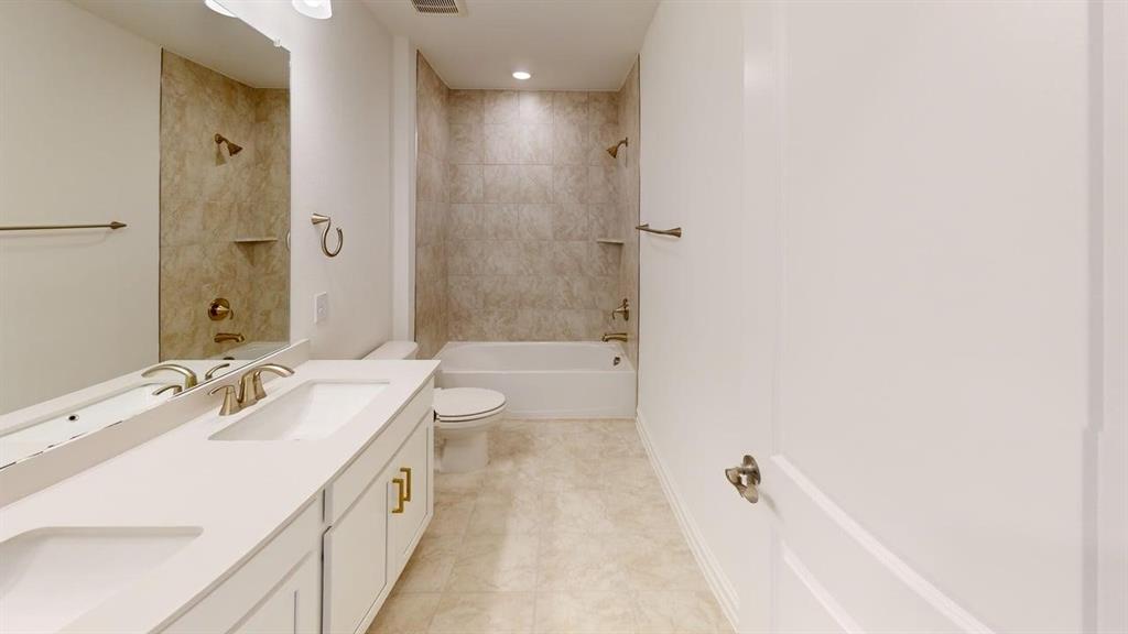 1616 Prosper Lane Anna, TX 75409 - Photo 21 of 24 Full bath with double vanity and bathing tub / shower combination