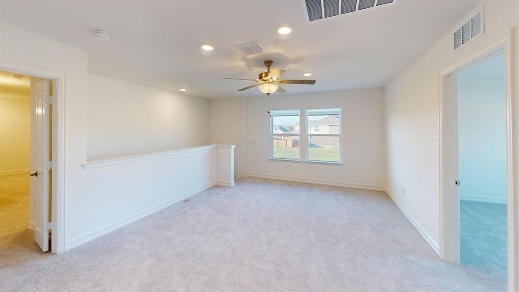 1616 Prosper Lane Anna, TX 75409 - Photo 6 of 24 Unfurnished room featuring recessed lighting, light carpet, and ceiling fan